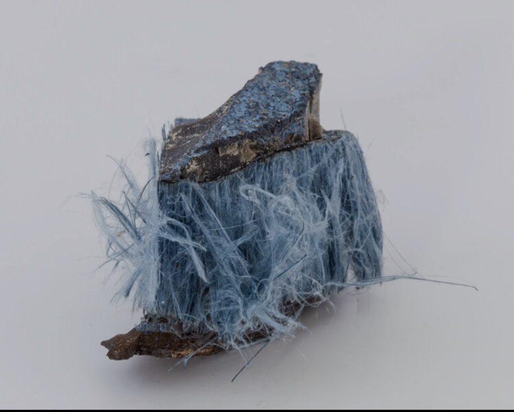 Asbestos-containing material in an older building showing the type of hazard covered during asbestos awareness training